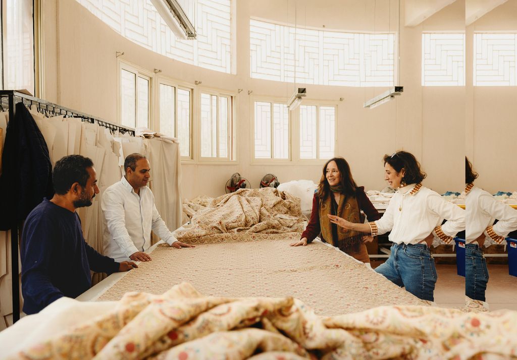 Goya and Cruz with their factory manager Shenouda Lourance Younan and production manager Magdy Anwar Helmy.