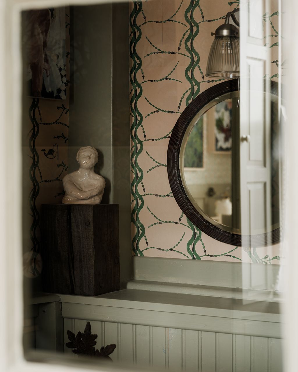 The wallpaper in this ensuite is Mermaid and Whale by Edward Bawden available through Brick House Design. One of Britas...