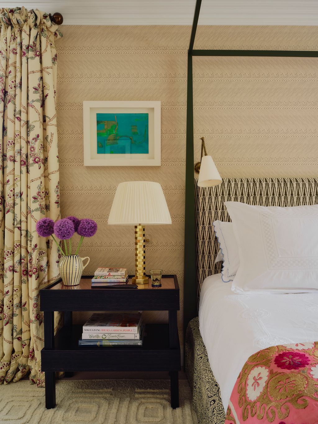 A detail of the main bedroom with the headboard covered in Sarah Vanrenens ‘Ziggy.