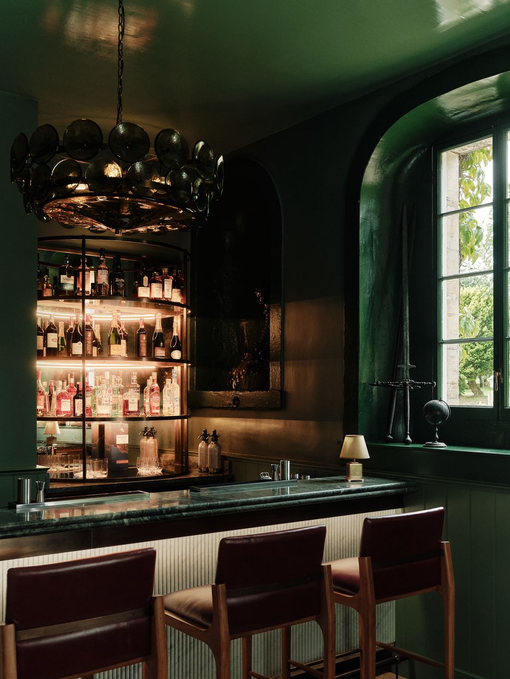 A bar is one of several smart spaces that have been created for guests to relax in within the renovated former stable...