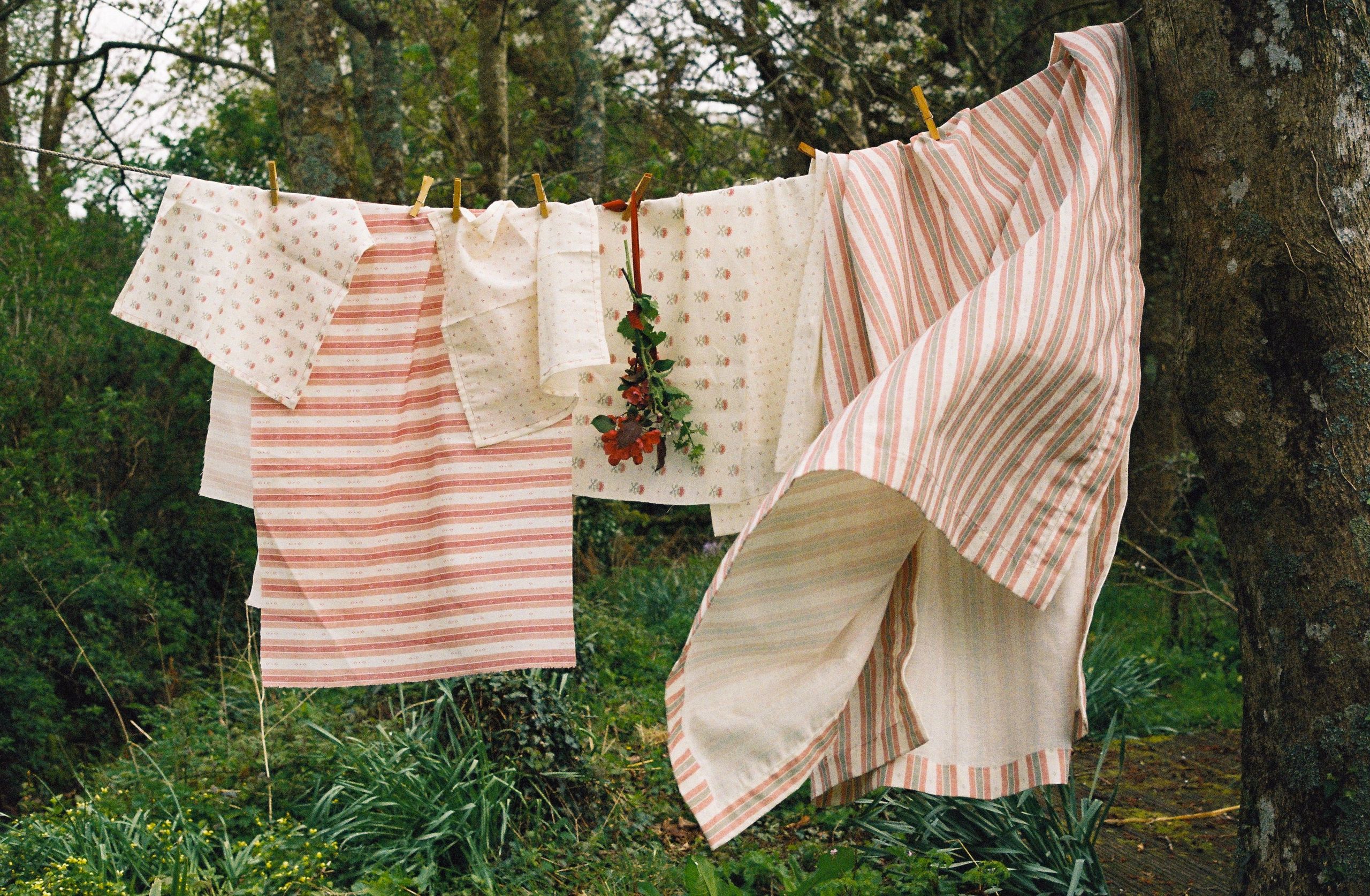 Image may contain: Clothing, Dress, Formal Wear, Fashion, Gown, Shirt, and Blouse