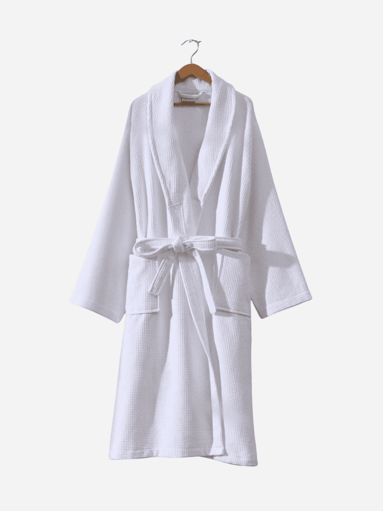 Image may contain: Fashion, Clothing, Robe, and Coat