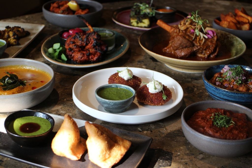 Image may contain Food Food Presentation Plate Bread and Fritters
