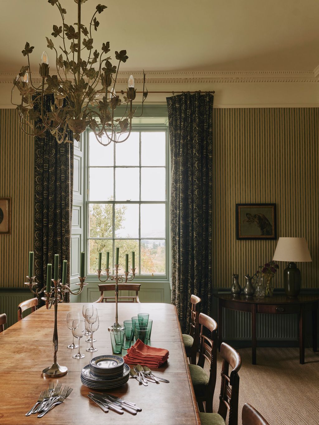 Image may contain Architecture Building Dining Room Dining Table Furniture Indoors Room Table Chandelier and Lamp