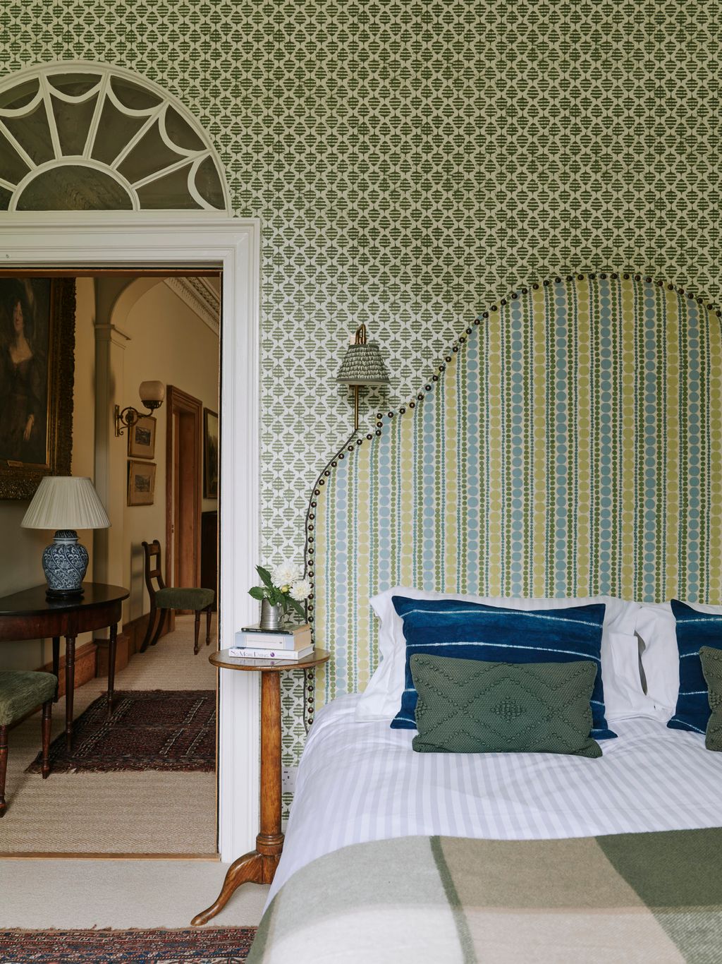 Image may contain Indoors Interior Design Home Decor Cushion Furniture Lamp Chair Floor Bed Bedroom and Room