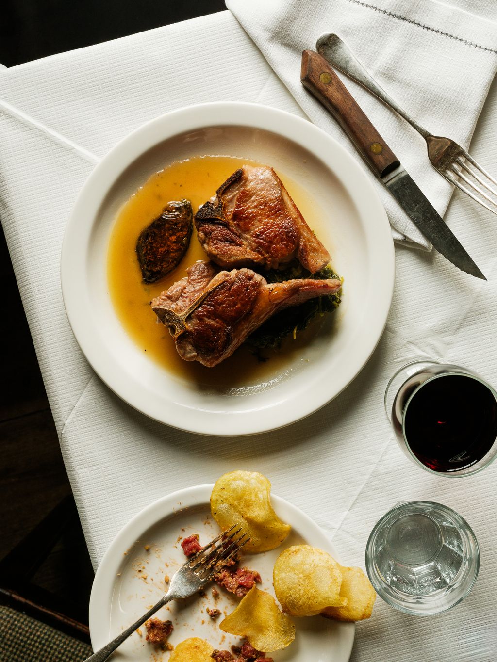 Image may contain Food Food Presentation Meat Mutton Pork Blade Knife Weapon and Plate