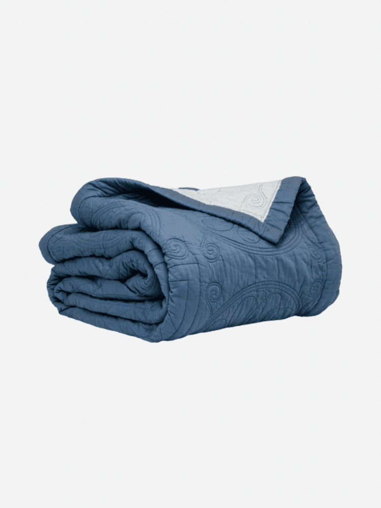 Image may contain Blanket Clothing and Glove