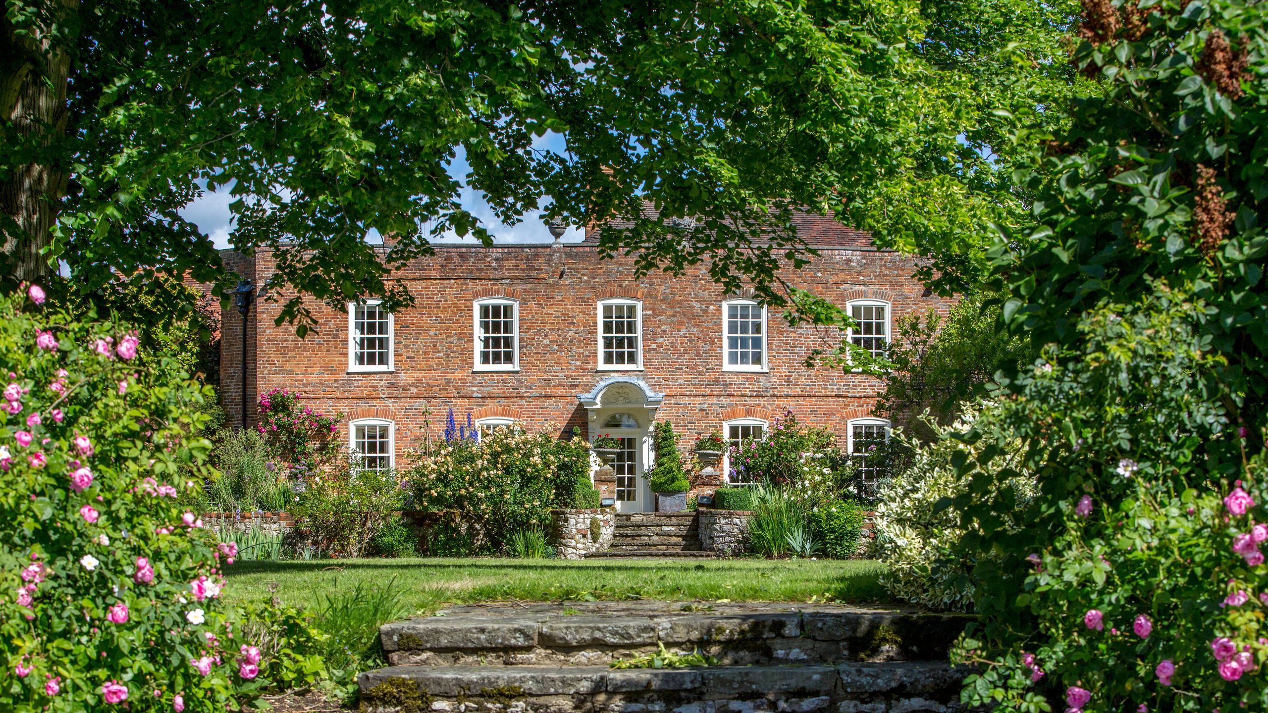 Image may contain: Architecture, Building, Housing, House, Manor, and Staircase