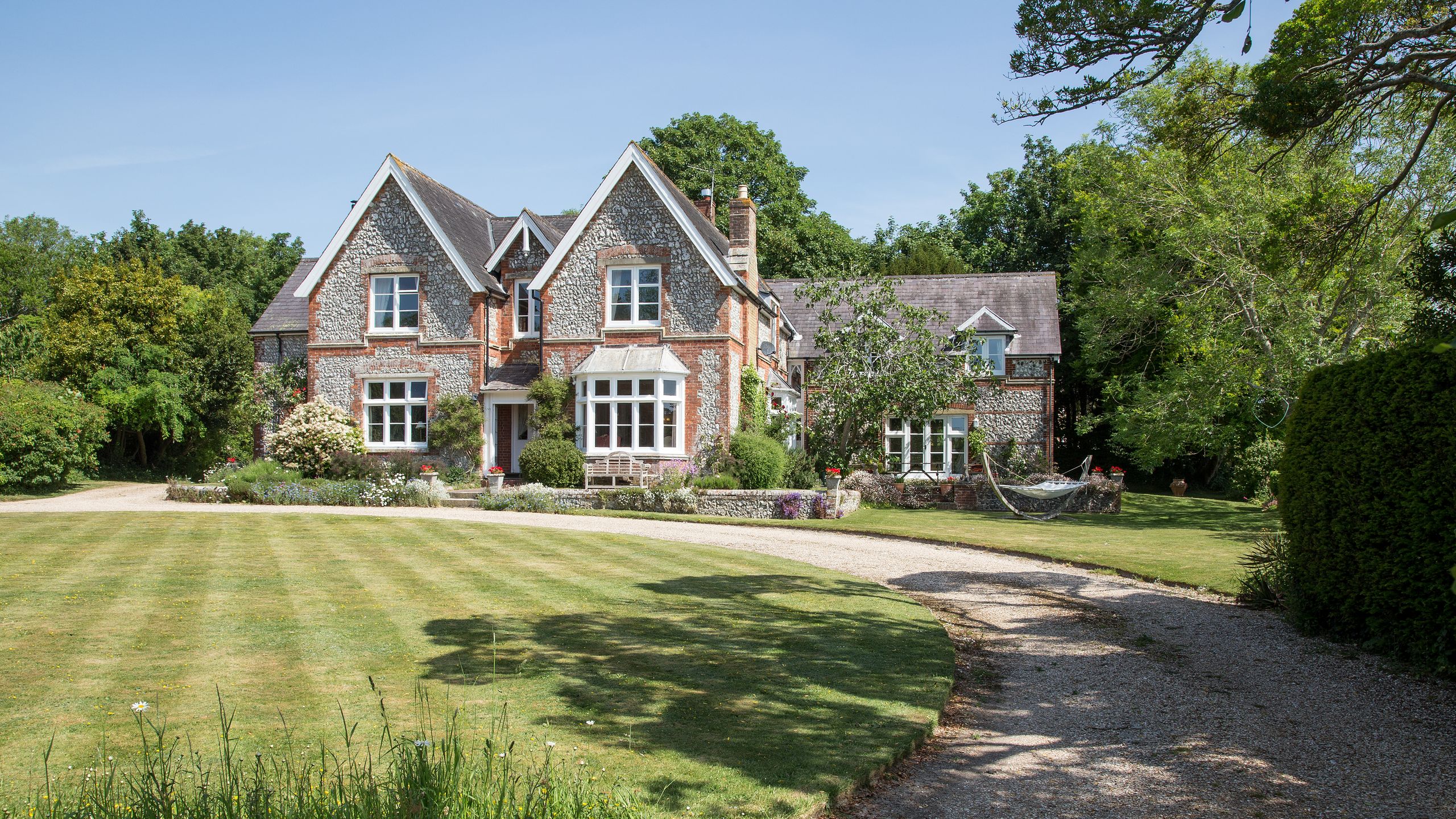 Image may contain: Architecture, Building, Housing, House, Manor, and Outdoors