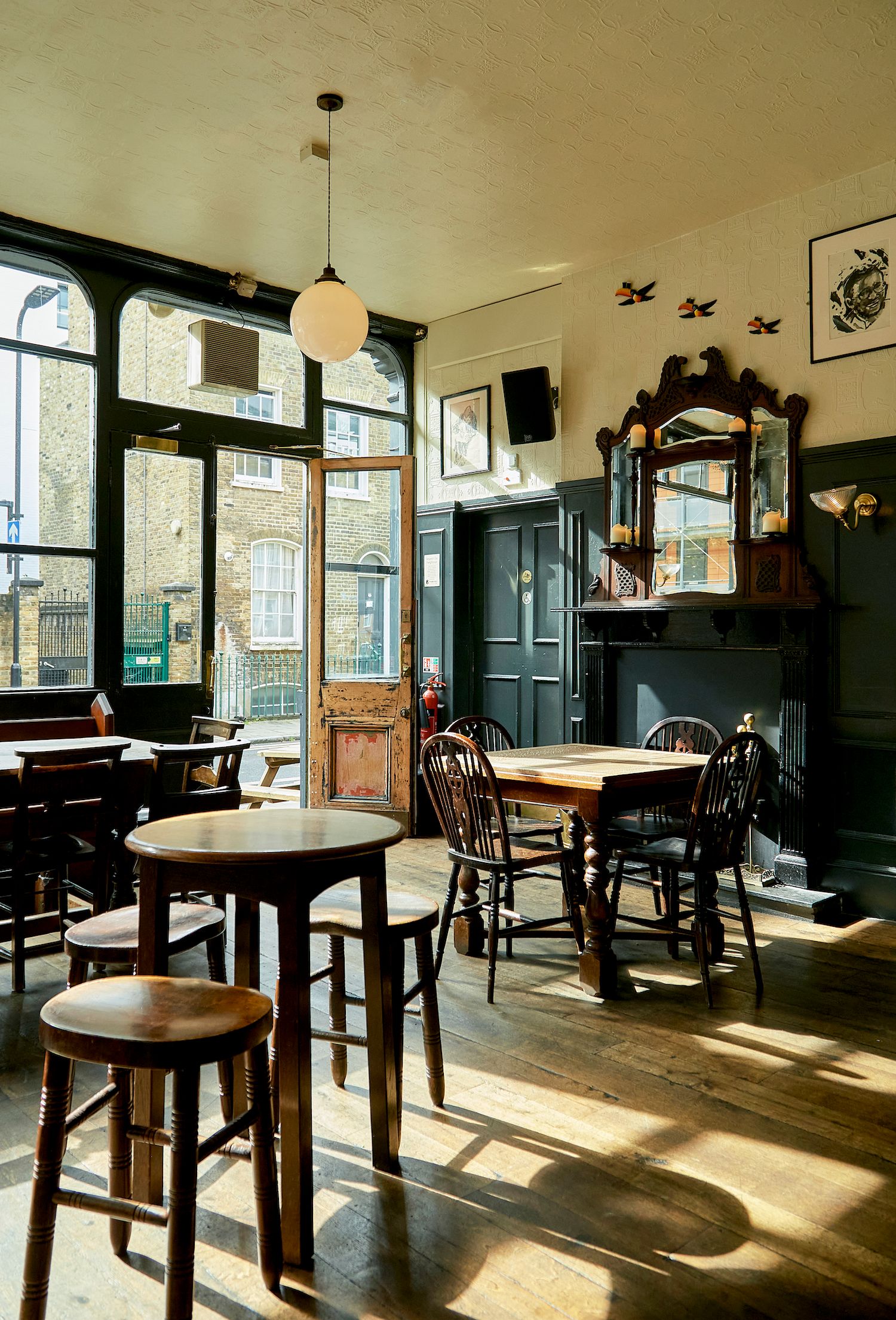 Image may contain Architecture Building Dining Room Dining Table Furniture Indoors Room Table Restaurant and Cafe