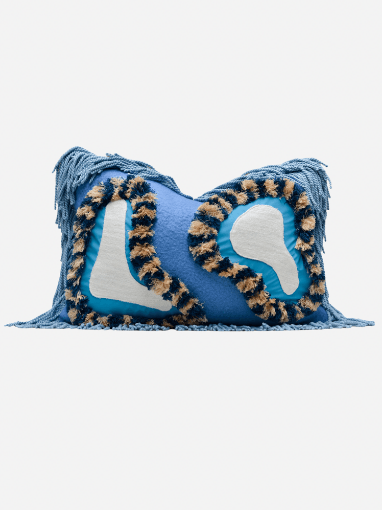 Image may contain: Cushion, Home Decor, Pillow, Clothing, and Scarf