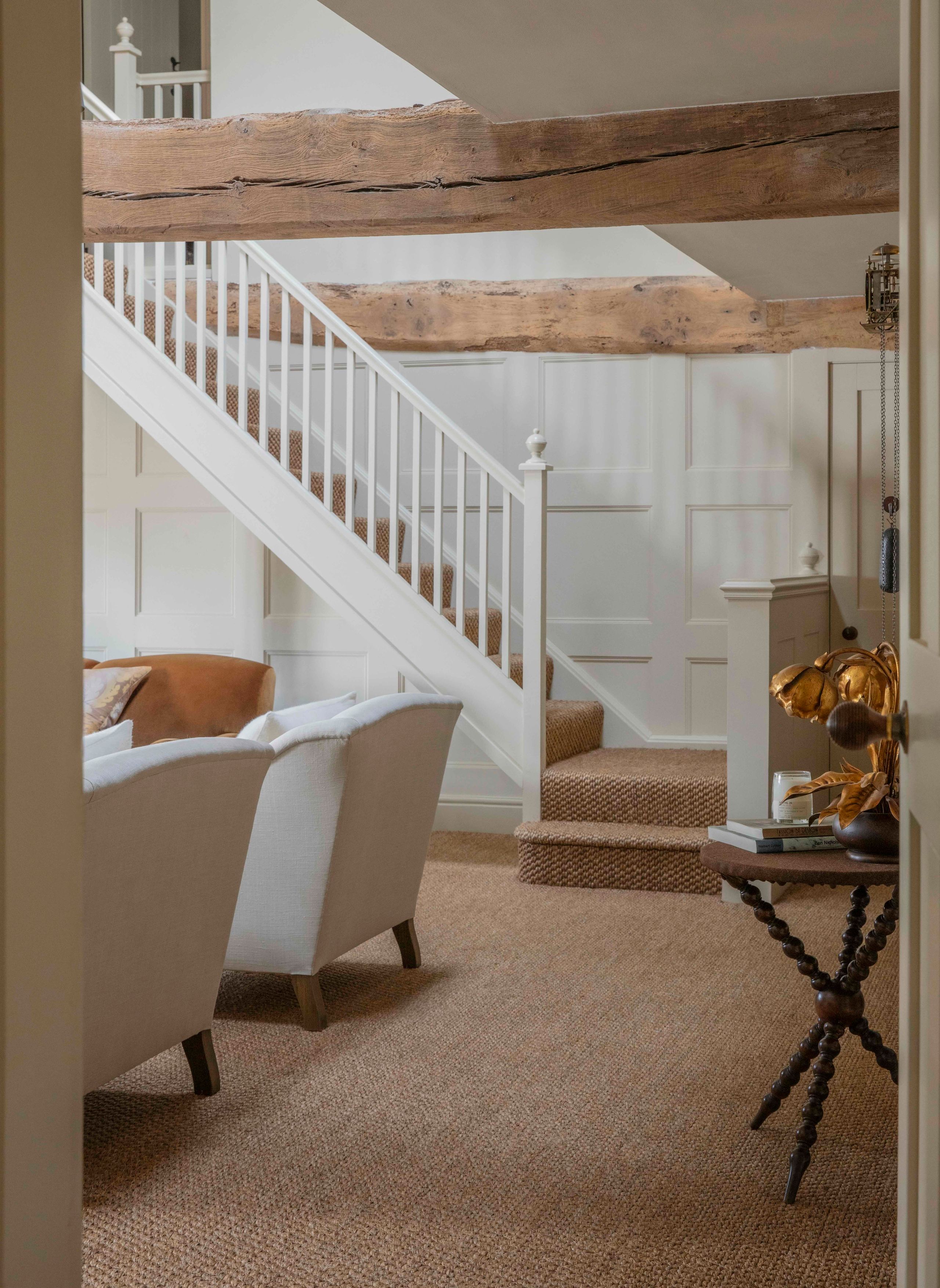 Image may contain: Indoors, Interior Design, Architecture, Building, Foyer, Cup, Desk, Furniture, Table, and Living Room