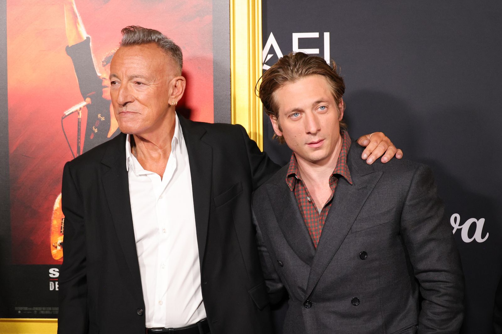 Image may contain Jeremy Allen White Bruce Springsteen Fashion Clothing Coat Formal Wear Suit Adult and Person