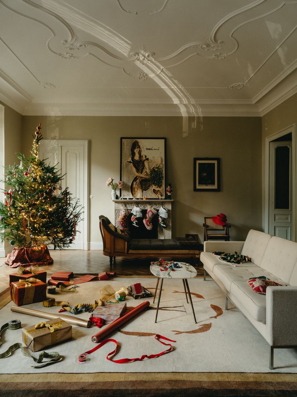 Image may contain Home Decor Architecture Building Furniture Indoors Living Room Room Couch and Christmas