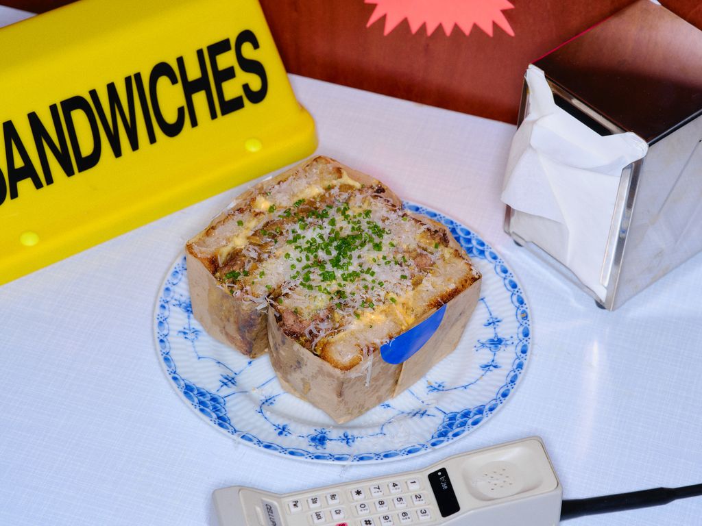 Image may contain Food Meat Pork Pizza and Food Presentation