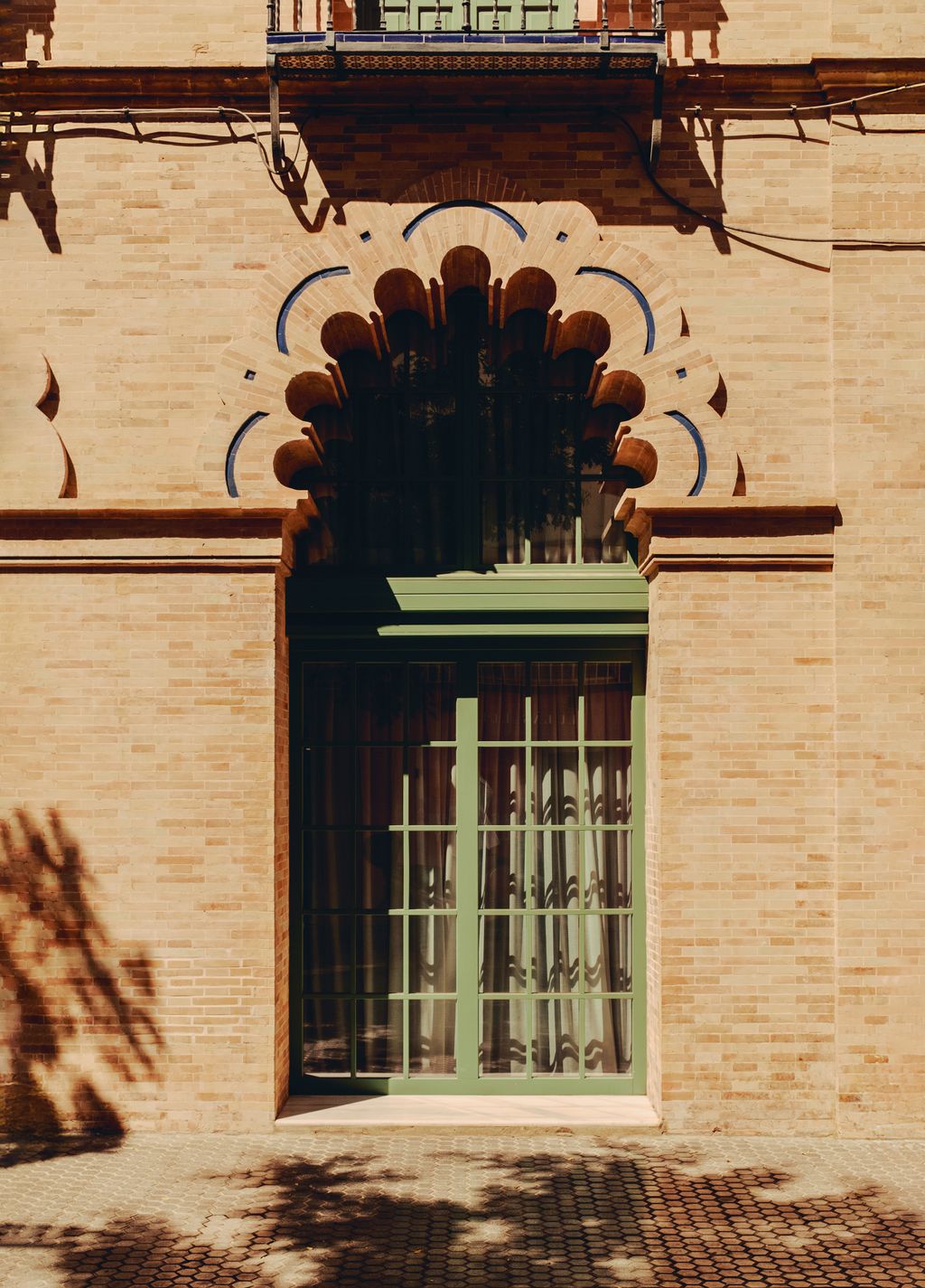 Image may contain Arch Architecture Home Decor Building Brick Gothic Arch Window and Door