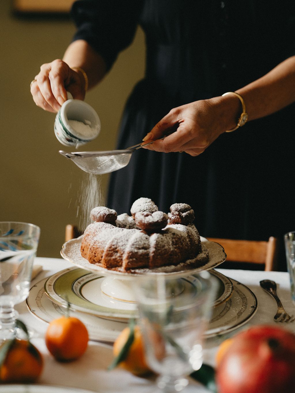 Image may contain Cooking Food Food Presentation Sprinkling Cutlery Fork and Pouring Food