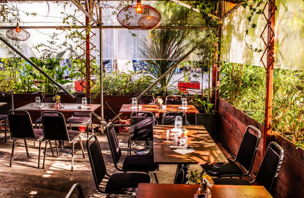 Image may contain Indoors Restaurant Architecture Building Dining Room Dining Table Furniture Room Table and Cafe