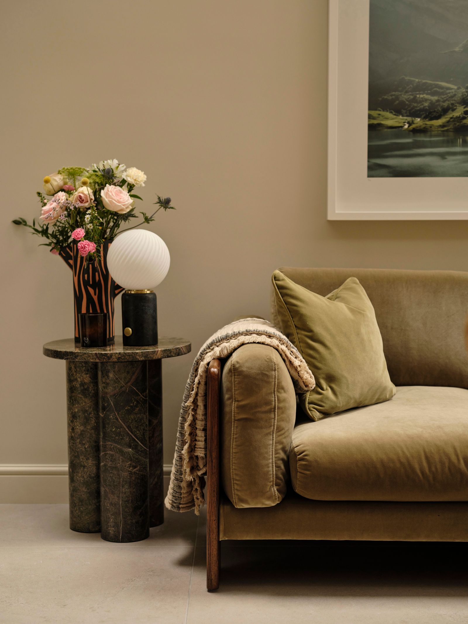 Image may contain Flower Flower Arrangement Plant Couch Furniture Cushion Home Decor Lamp Art and Painting