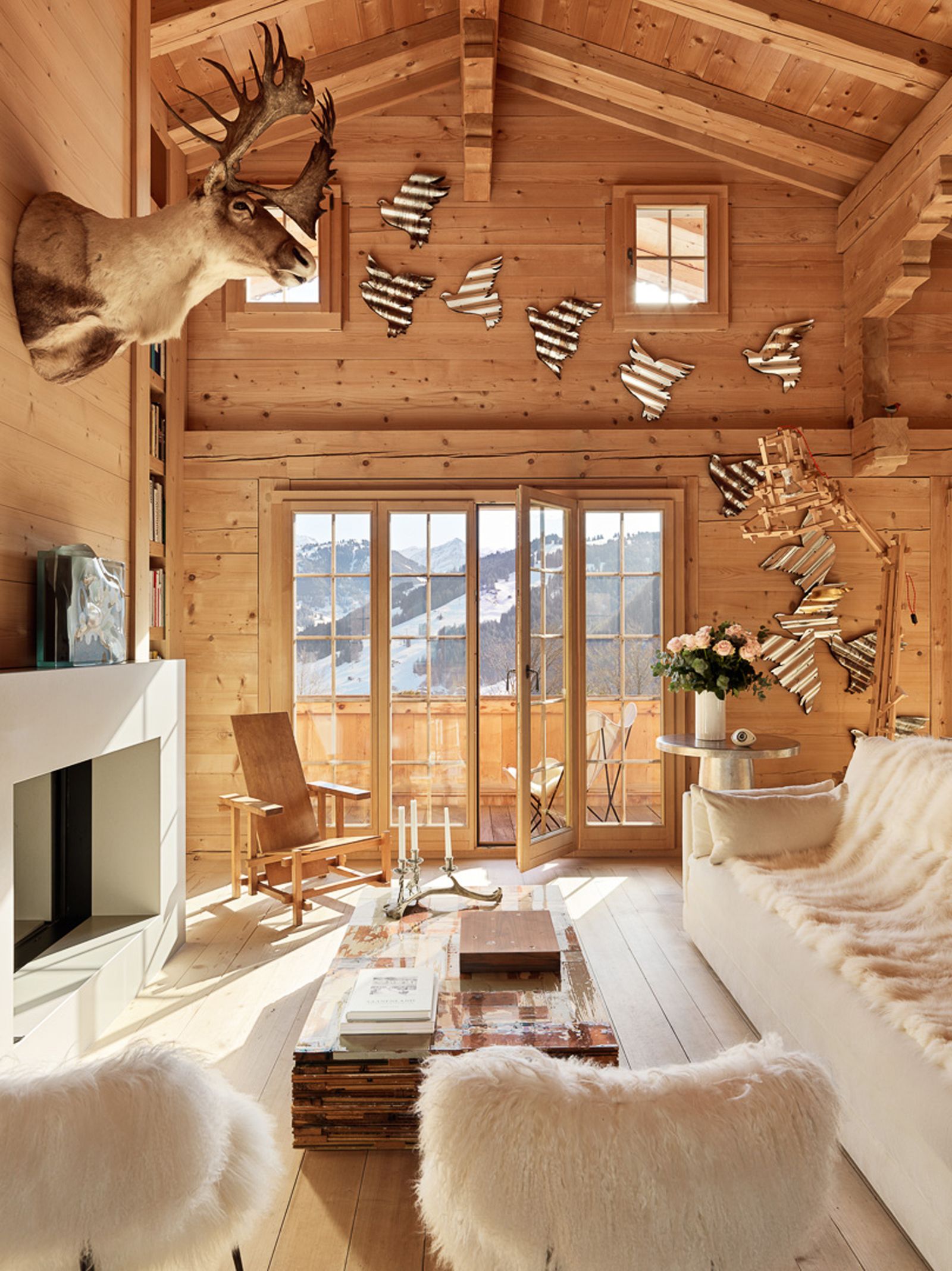 Image may contain Indoors Interior Design Wood Architecture Building Furniture Living Room Room and Home Decor