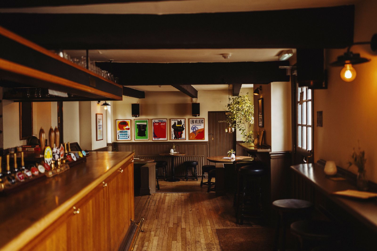 Image may contain Wood Indoors Interior Design Hardwood Floor Flooring Stained Wood Dining Table and Furniture