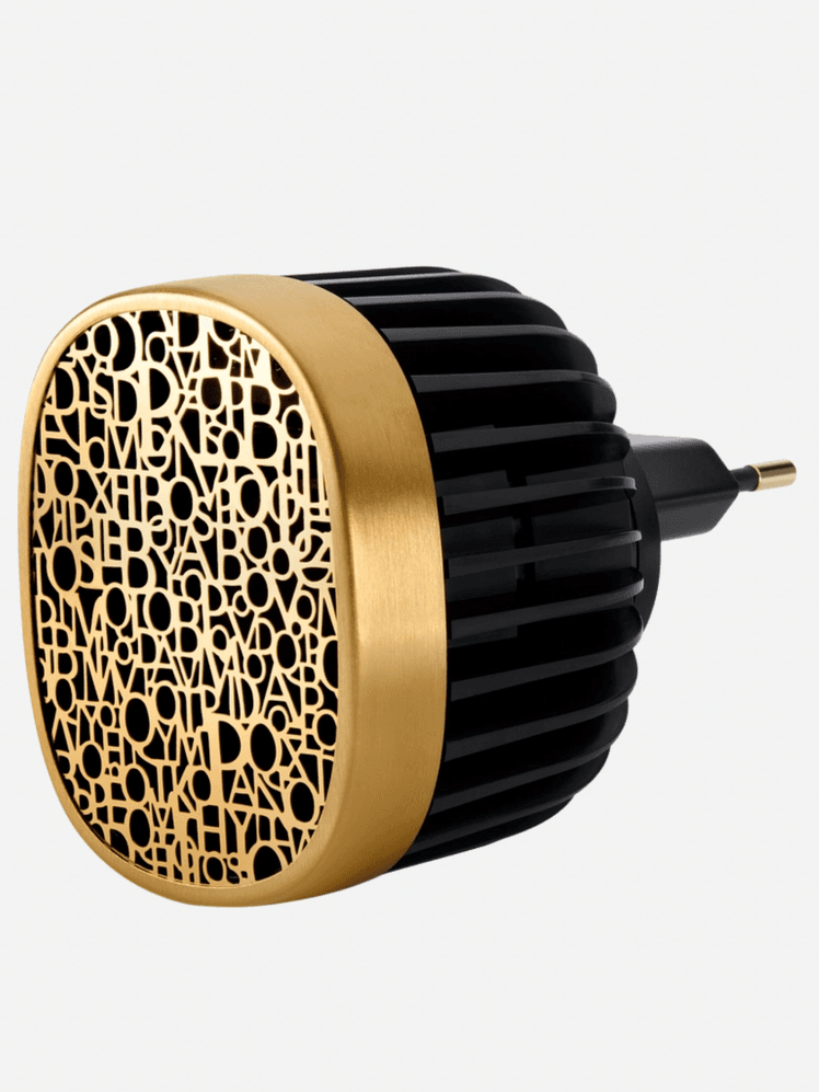 Image may contain: Electrical Device, Microphone, and Tape