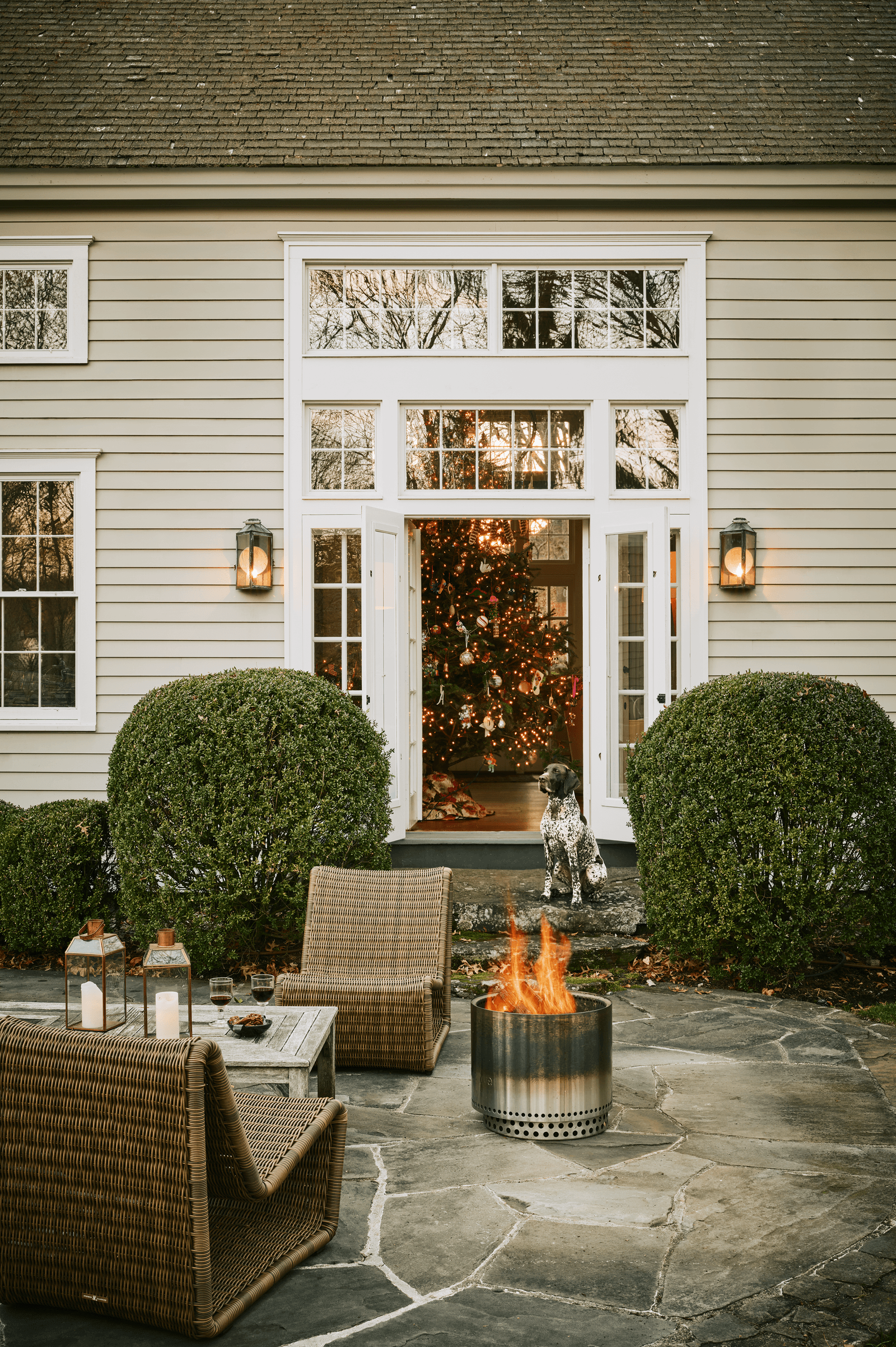 Image may contain Chair Furniture Architecture Building Housing Door Couch Animal Canine Dog Mammal and Pet