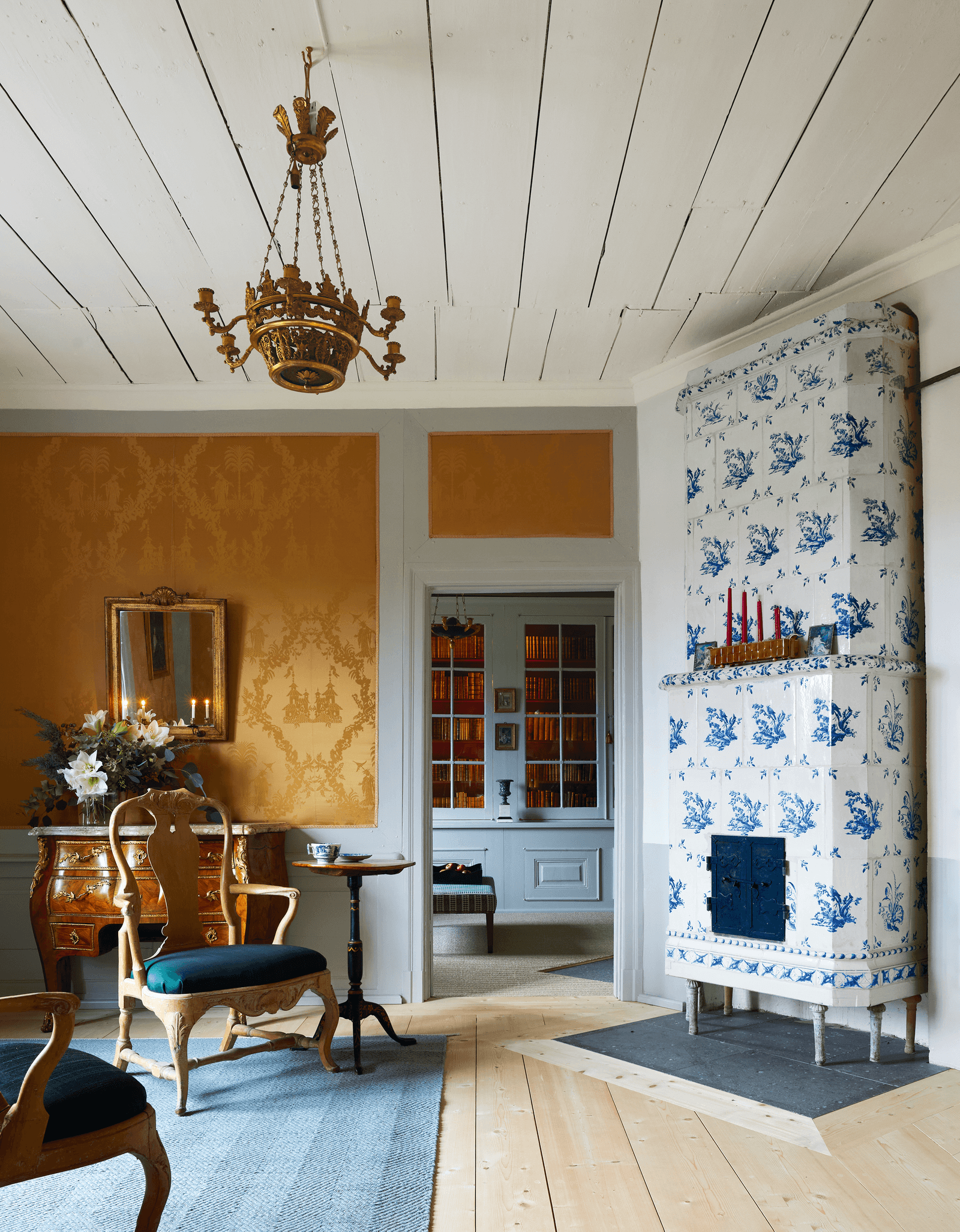 Image may contain Chandelier Lamp Indoors Interior Design Architecture Building Furniture Living Room and Room