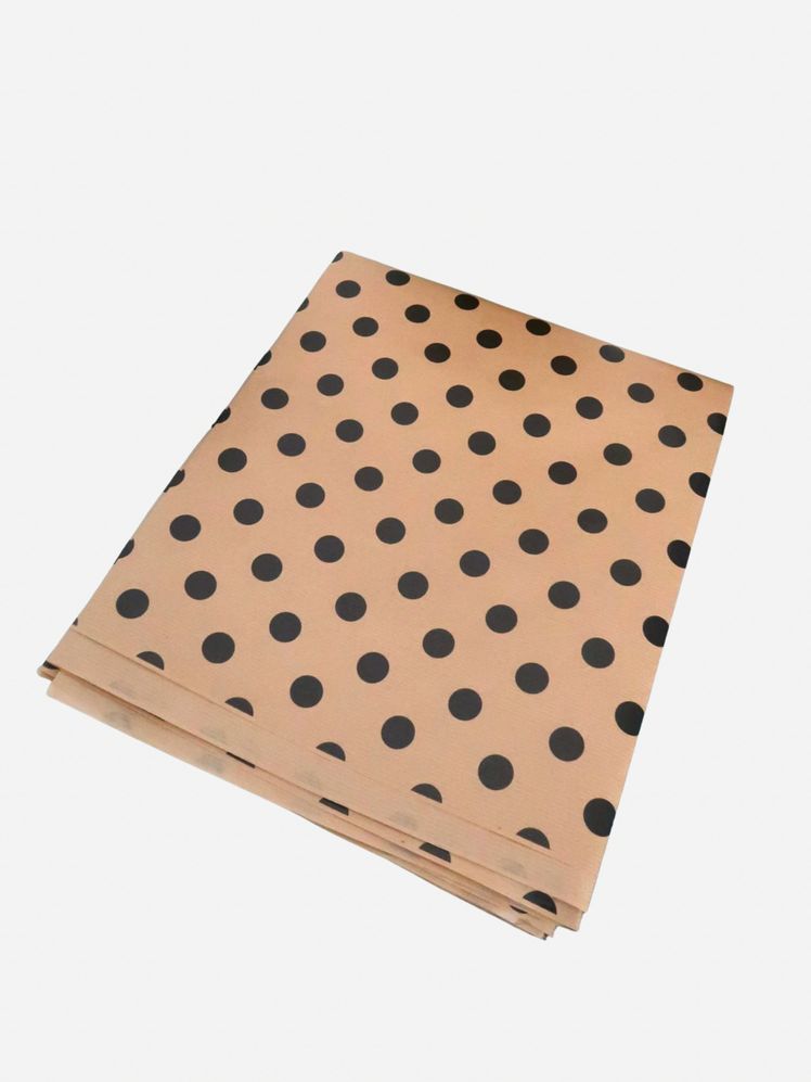 Image may contain: Pattern, and Polka Dot