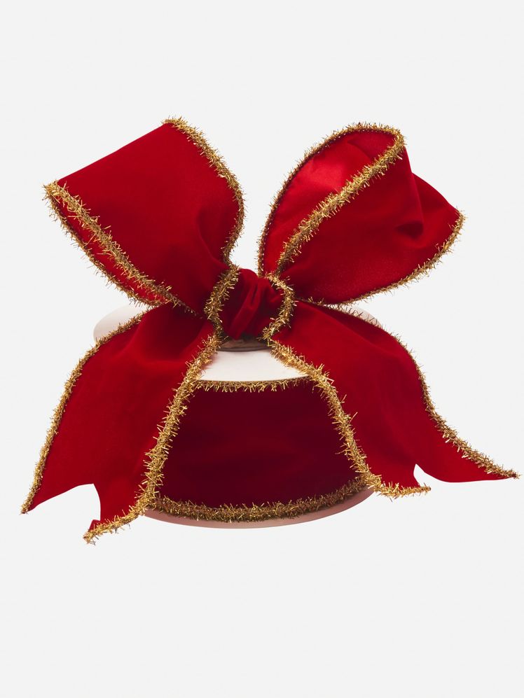 Image may contain: Velvet, Accessories, Formal Wear, Tie, and Person