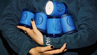 Image may contain Body Part Finger Hand Person Cup and Baby