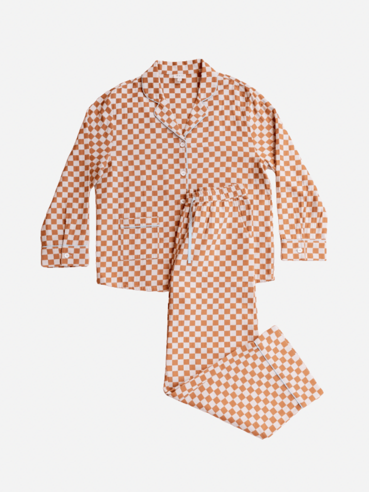 Image may contain: Formal Wear, Clothing, Coat, Accessories, and Tie