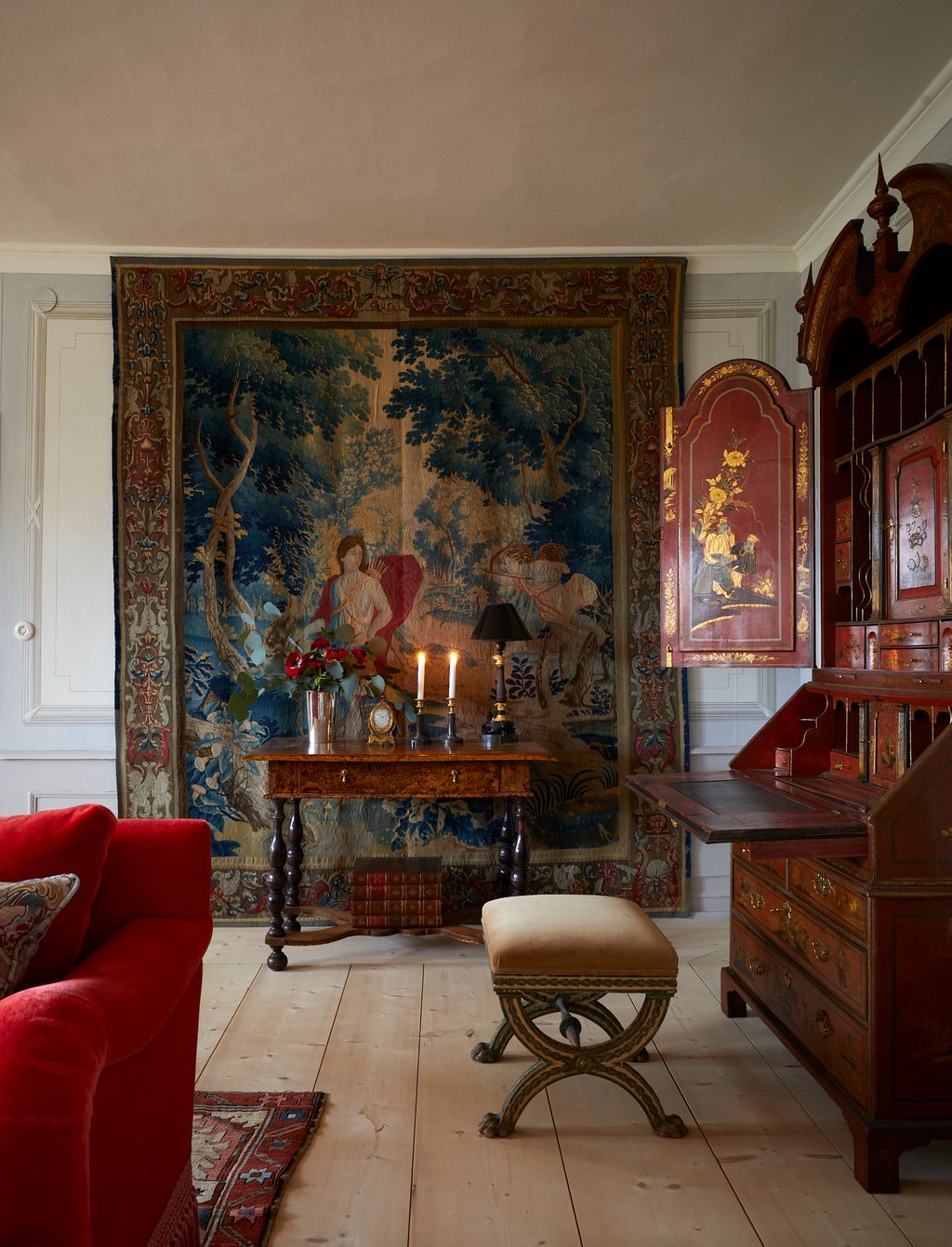 Image may contain Home Decor Rug Person Architecture Building Furniture Indoors Living Room Room and Adult