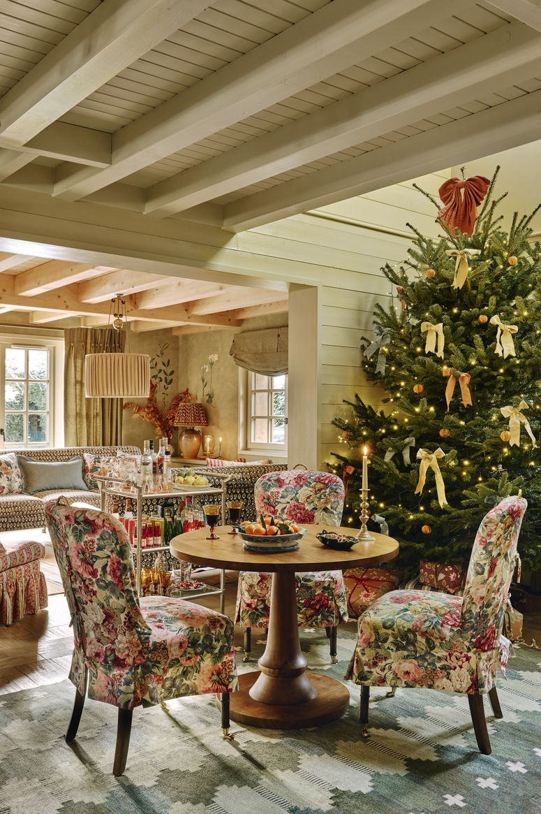 Image may contain: Christmas, Christmas Decorations, Festival, Chair, Furniture, Christmas Tree, and Table