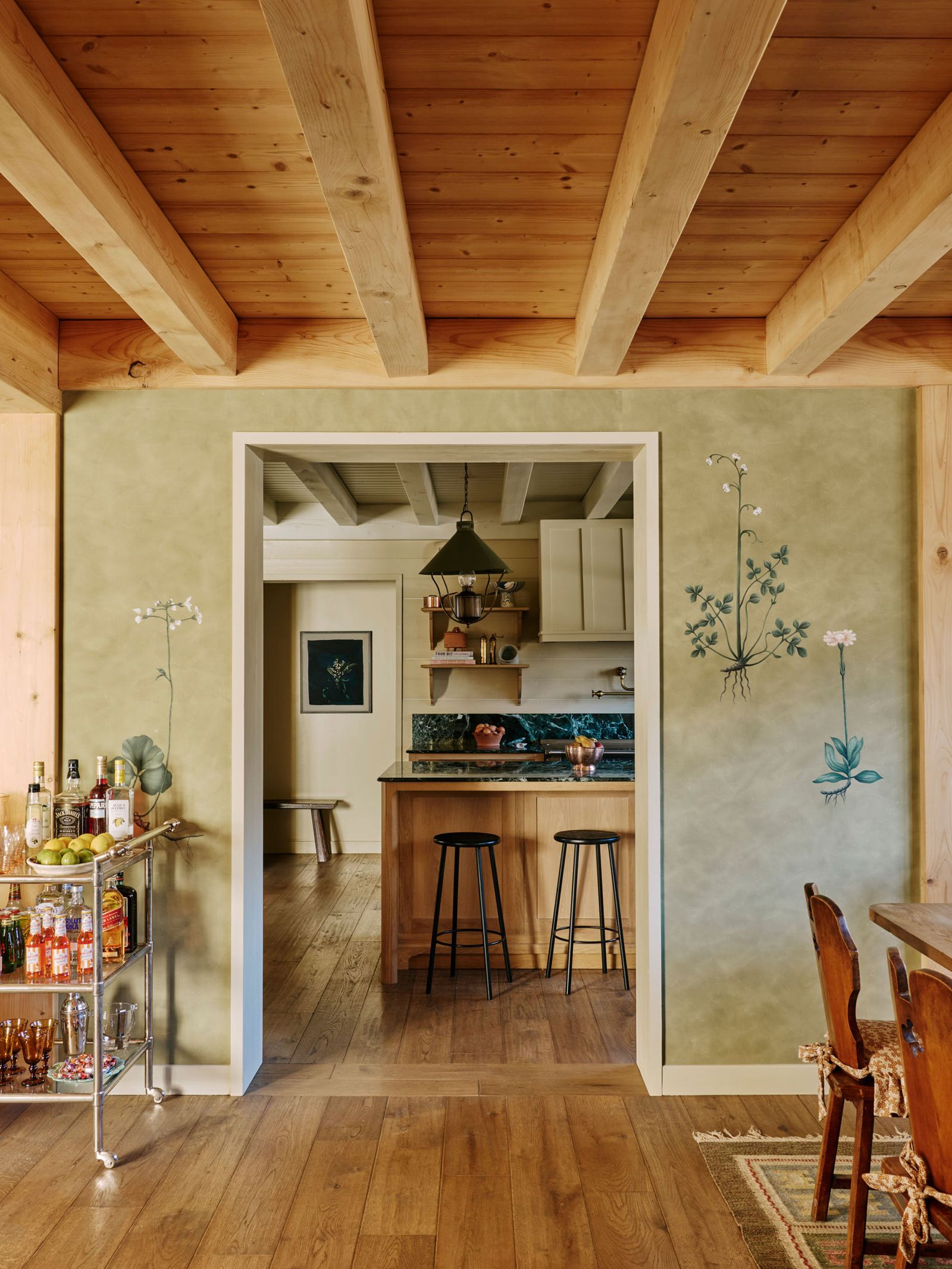 Image may contain Indoors Interior Design Wood Floor Hardwood Dining Table Furniture Table and Flooring