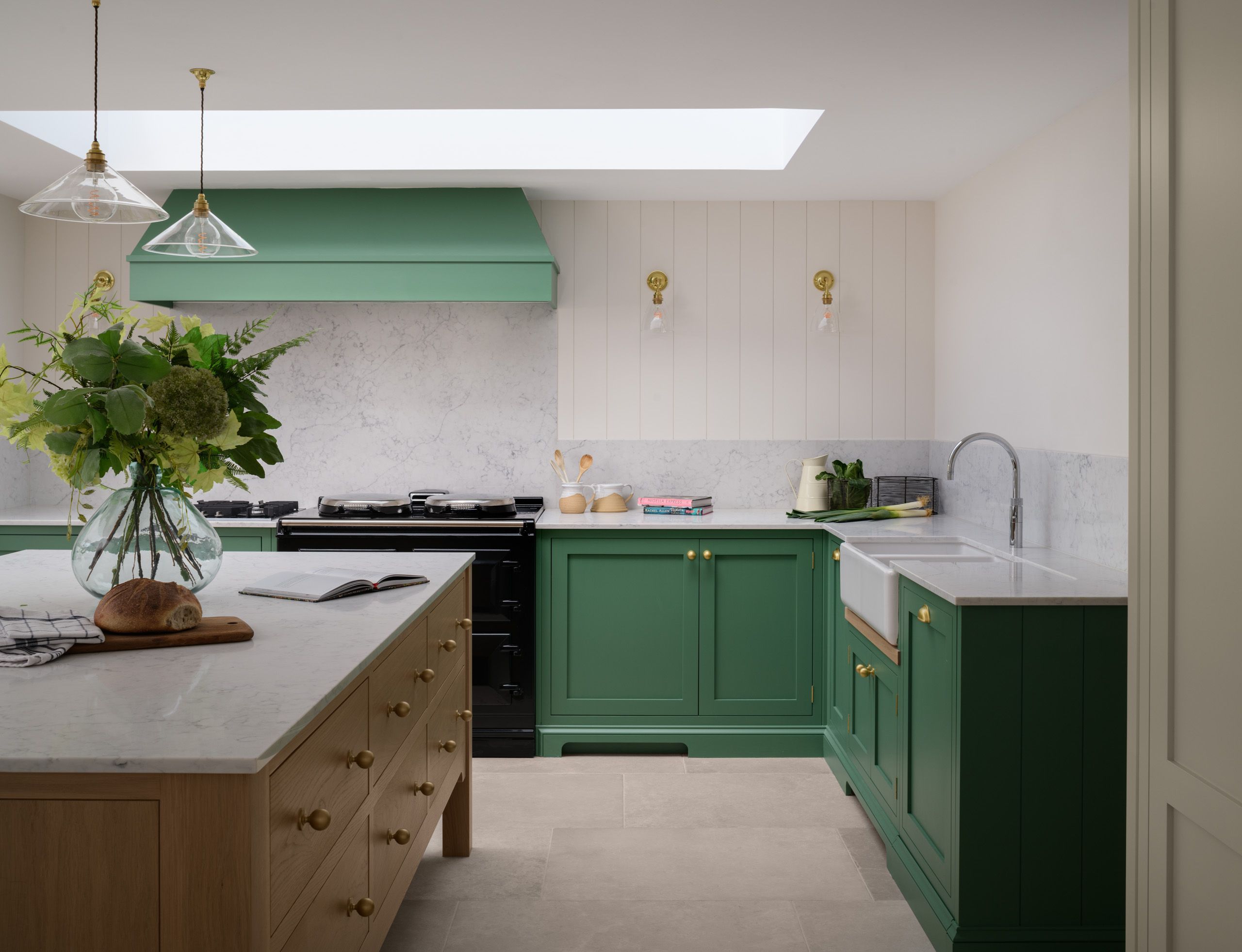 Image may contain: Indoors, Interior Design, Kitchen, Sink, Book, Publication, Sink Faucet, Kitchen Island, and Plant