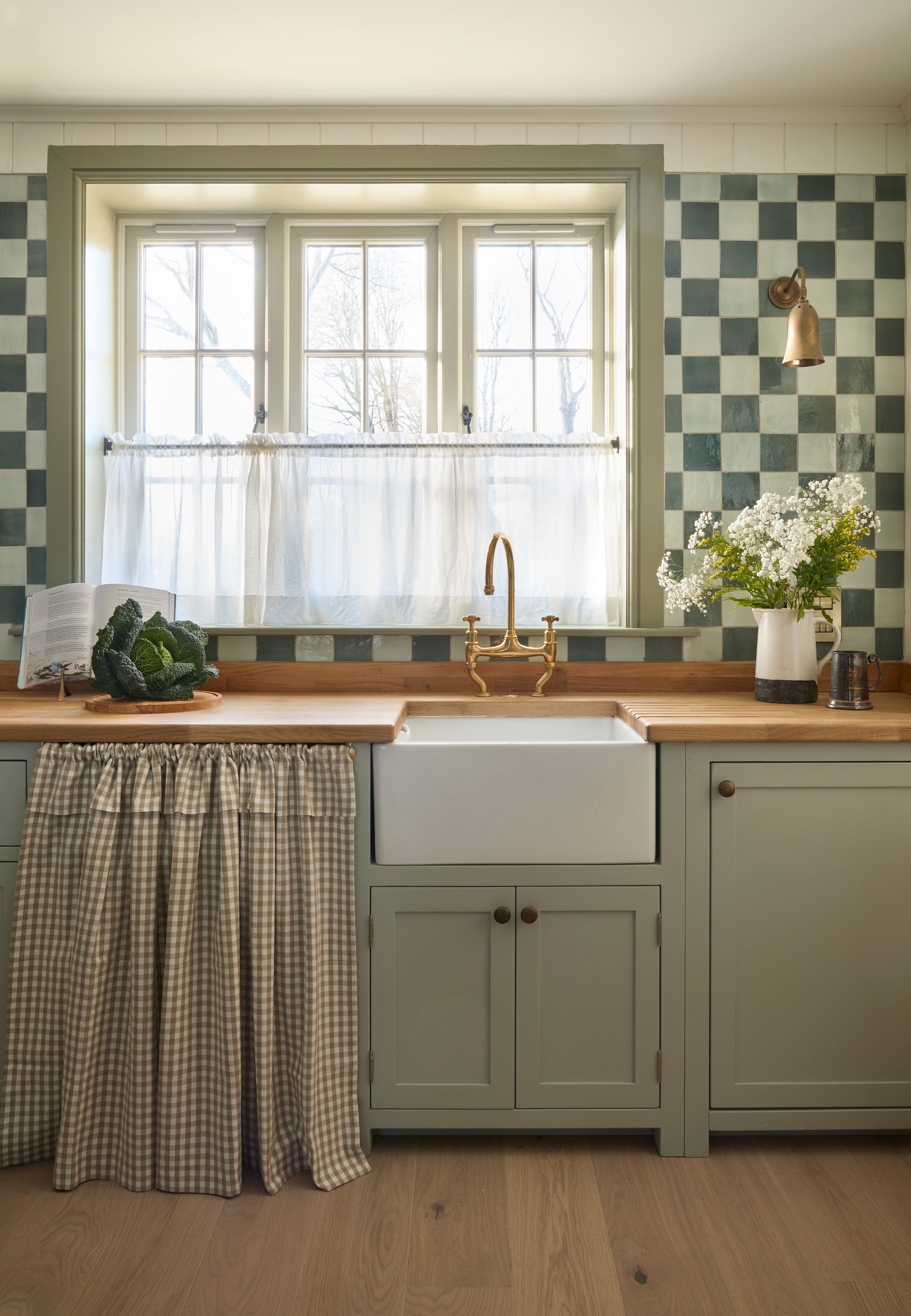 Image may contain: Book, Publication, Sink, Sink Faucet, Indoors, Interior Design, Window, and Lamp