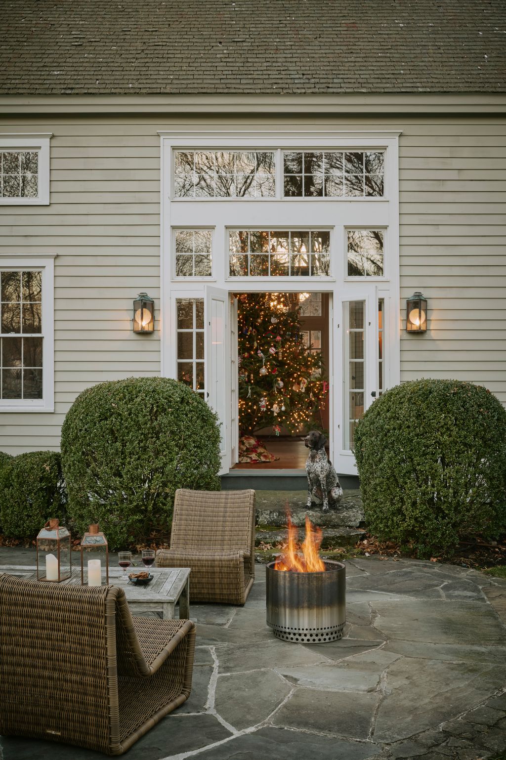 Image may contain Door Architecture Building Housing Animal Canine Dog Mammal Pet Candle Fireplace and Indoors