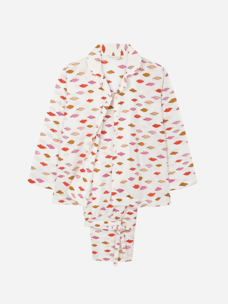 Image may contain: Clothing, Coat, Pajamas, Blouse, and Fashion