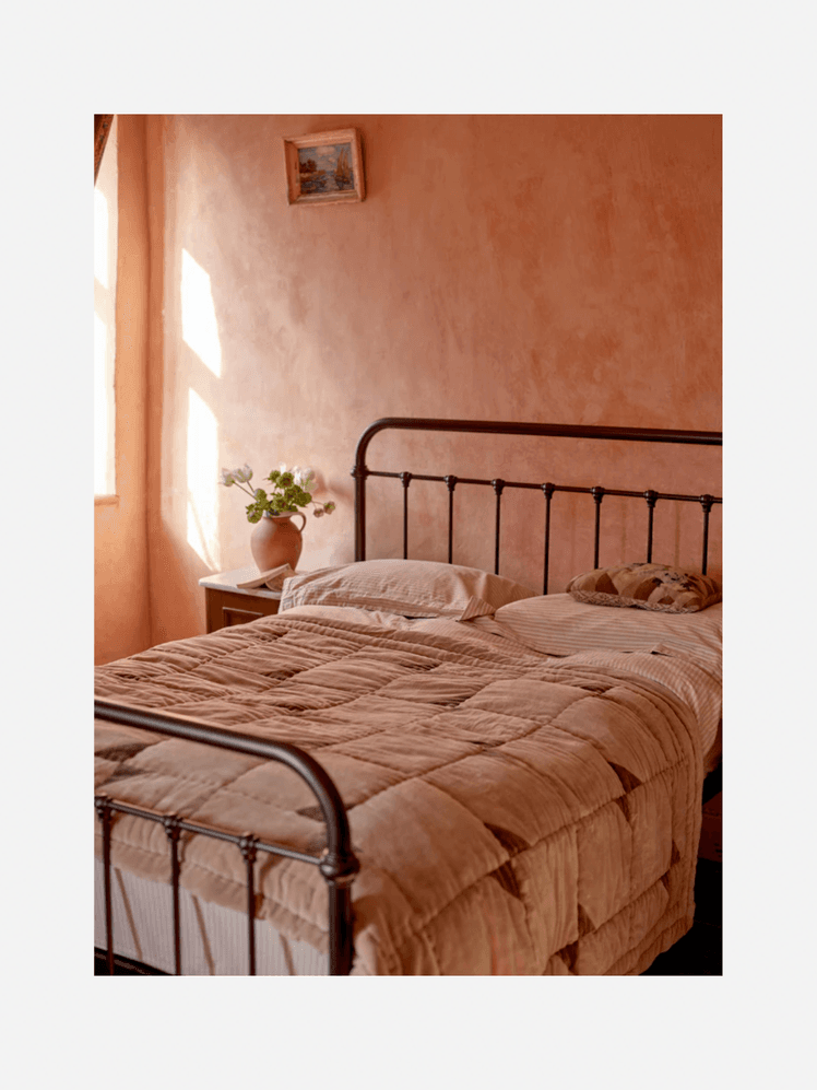 Image may contain: Indoors, Interior Design, Bed, Furniture, Home Decor, Linen, Bedroom, Room, and Cushion