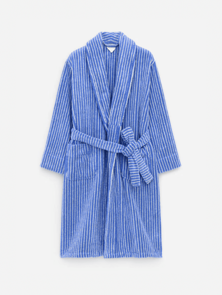 Image may contain: Fashion, Clothing, Robe, and Coat