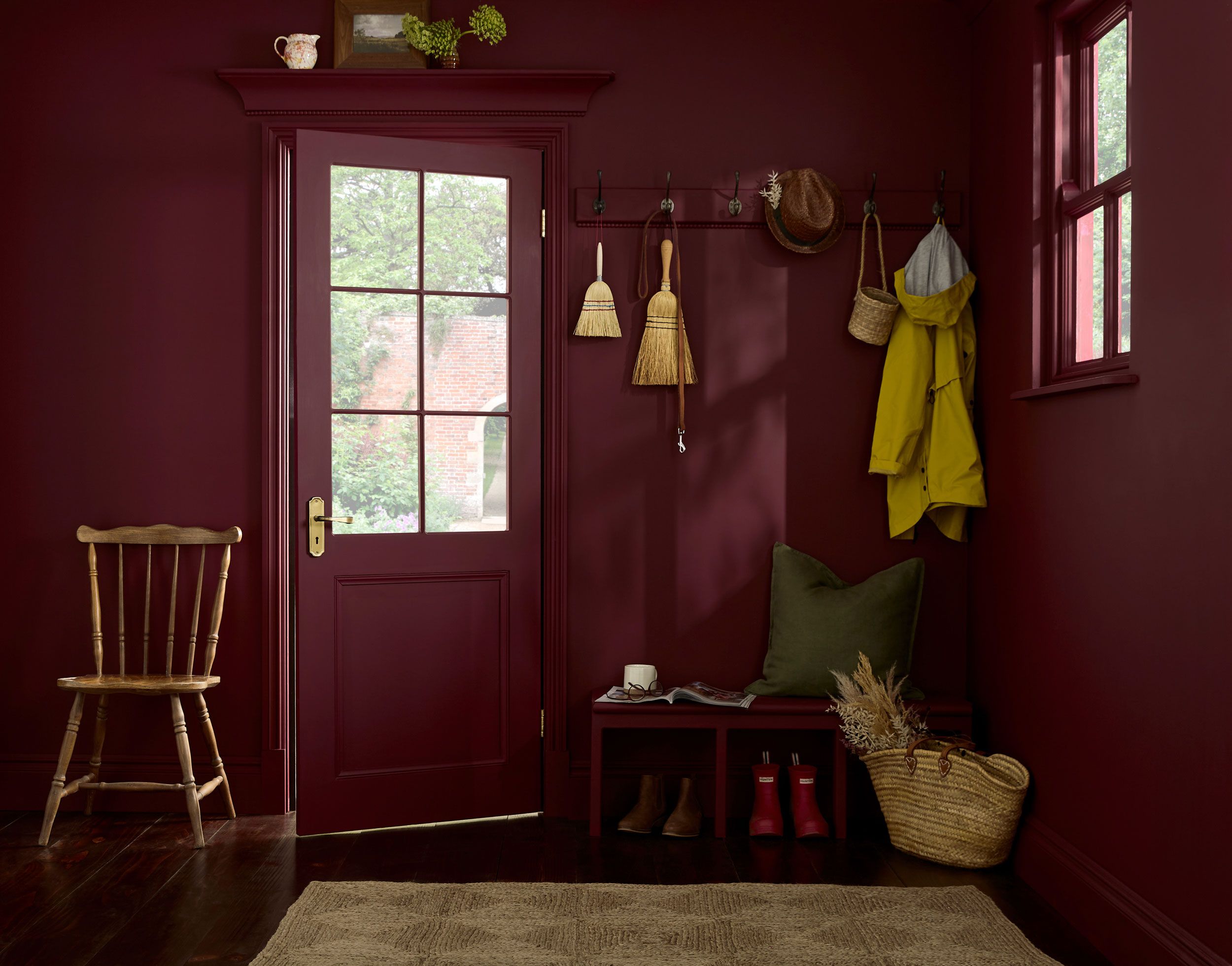 Image may contain: Indoors, Interior Design, Book, Publication, Door, Plant, Home Decor, Rug, Clothing, Footwear, and Shoe