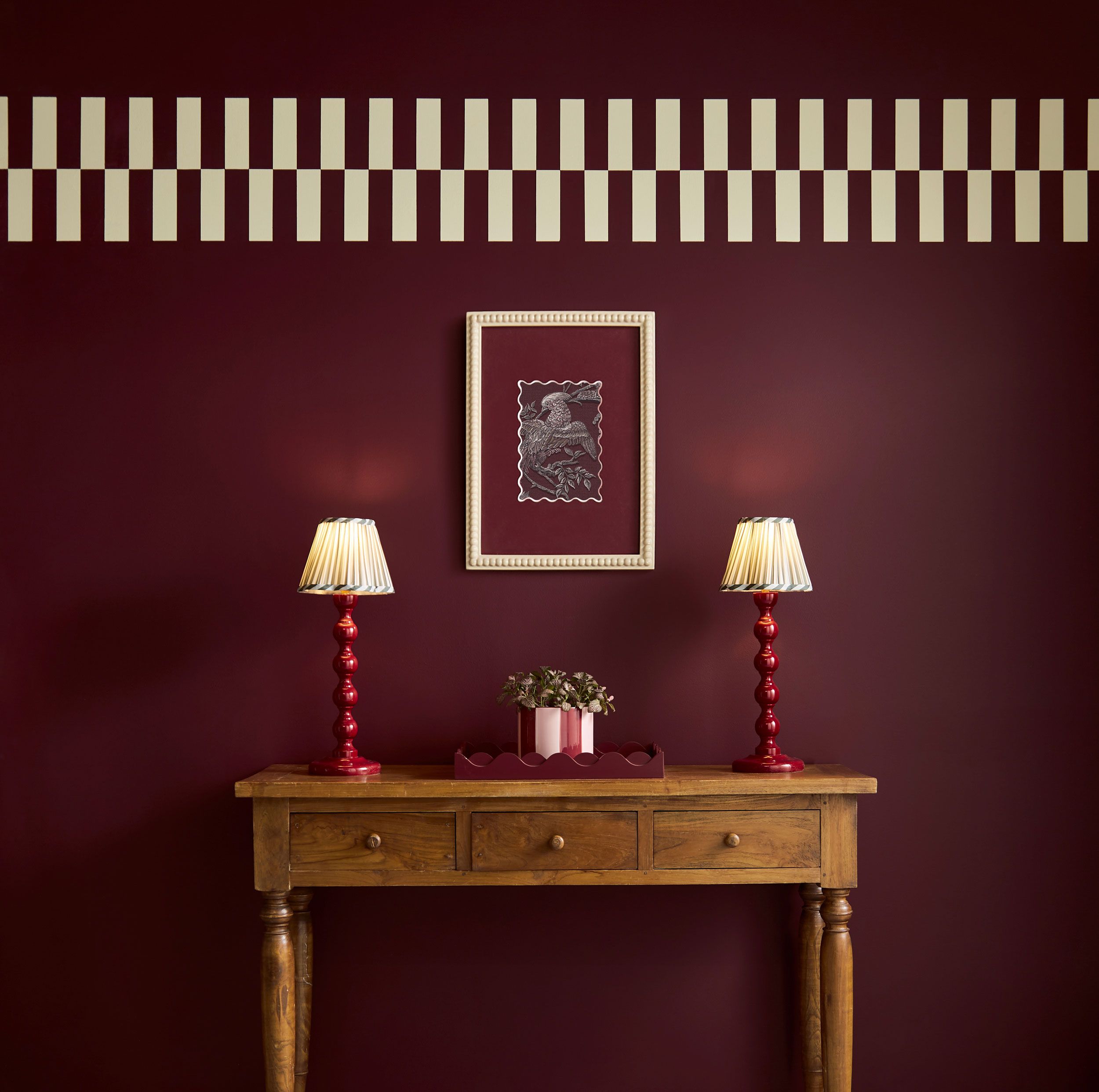 Image may contain: Lamp, Indoors, Interior Design, Architecture, Building, Wall, Table Lamp, Furniture, Table, and Sideboard