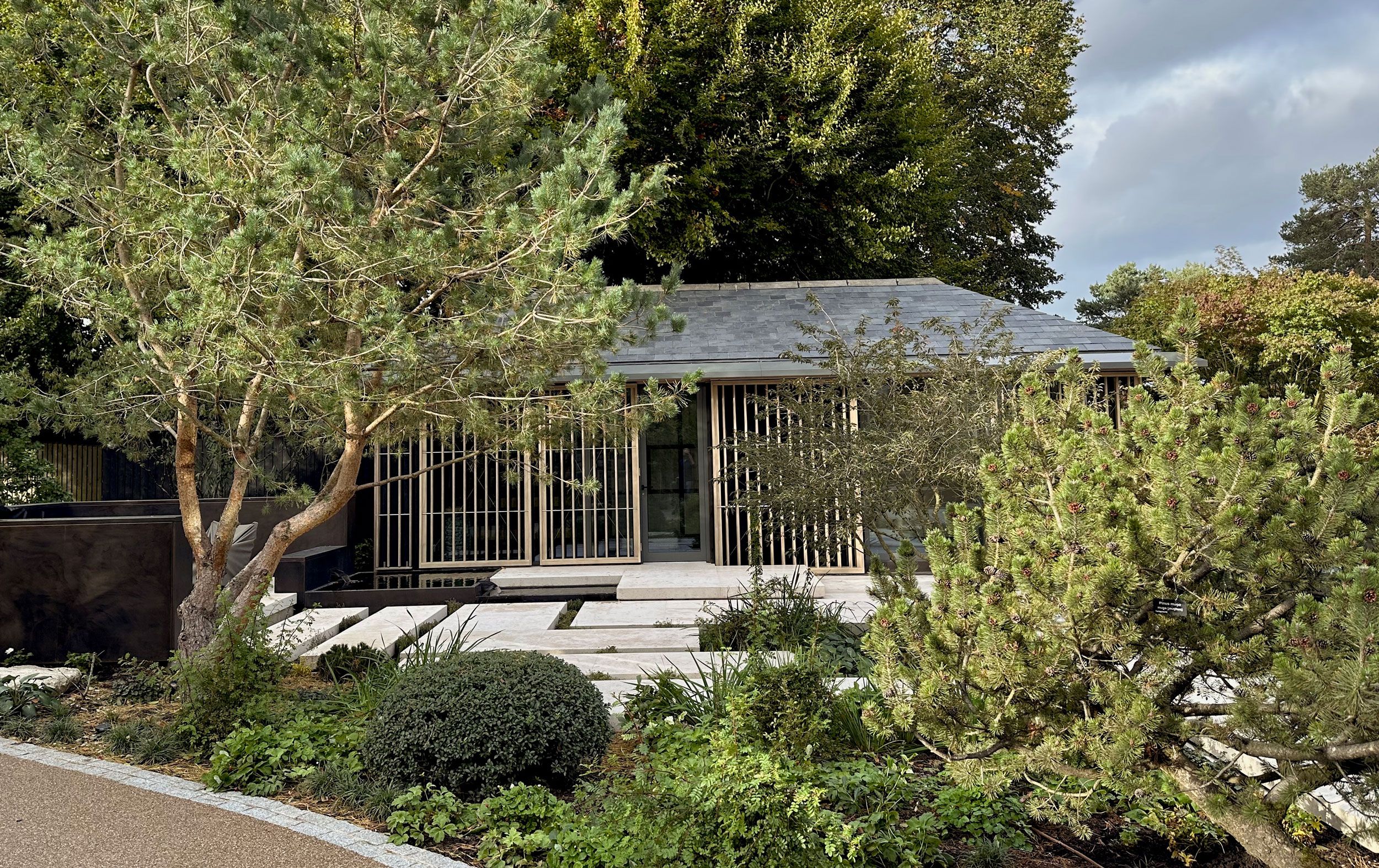 Image may contain: Garden, Nature, Outdoors, Architecture, Building, Housing, and House