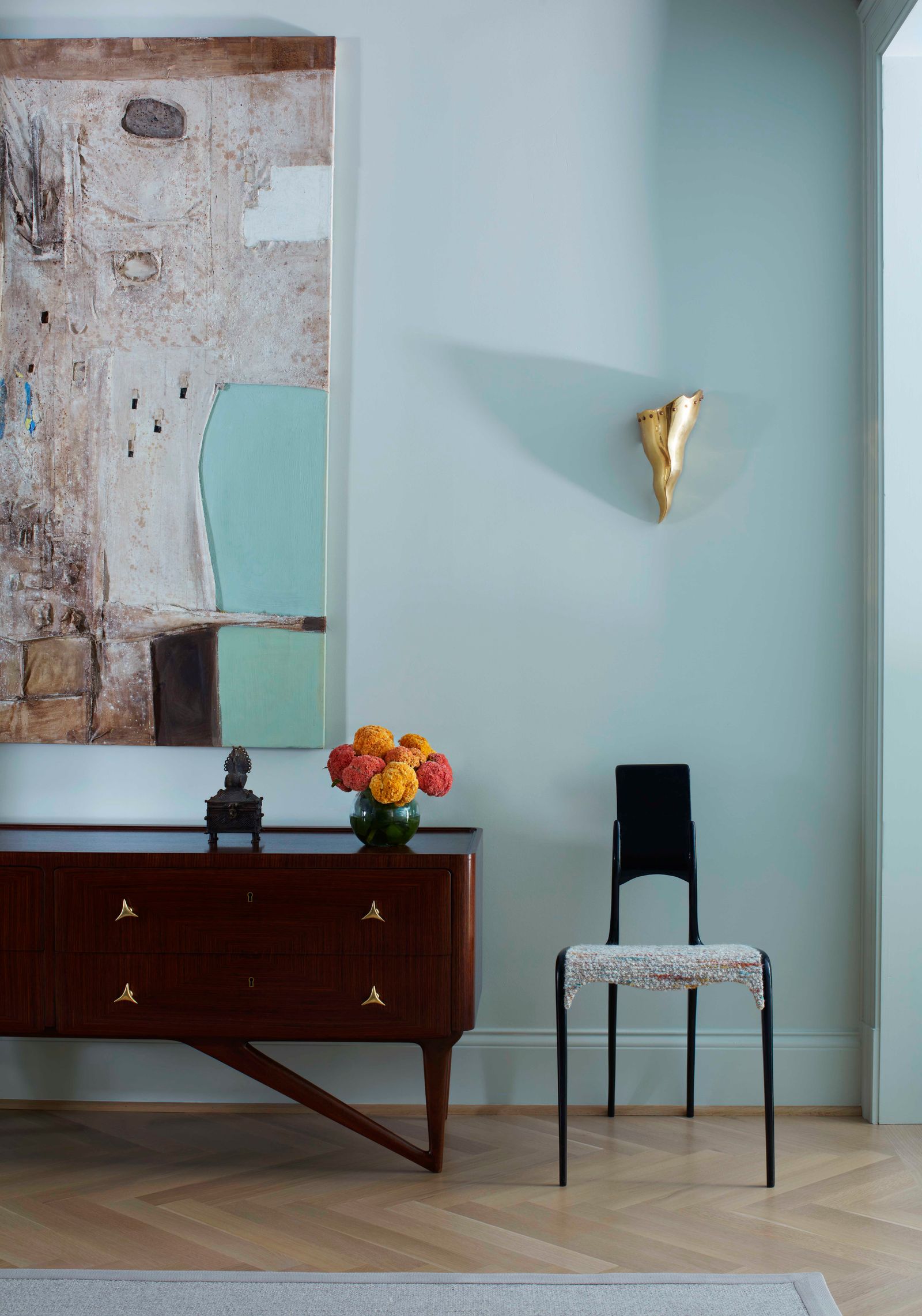 blue room with burgundy cabinet