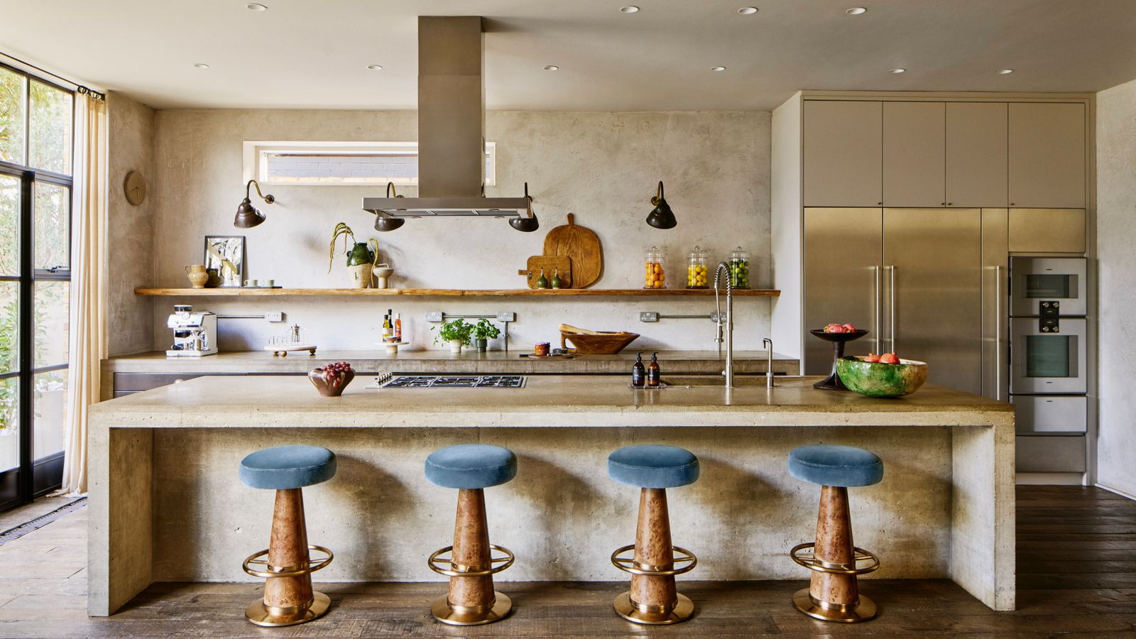 Image may contain Indoors Kitchen Bar Stool Furniture Cooktop and Interior Design