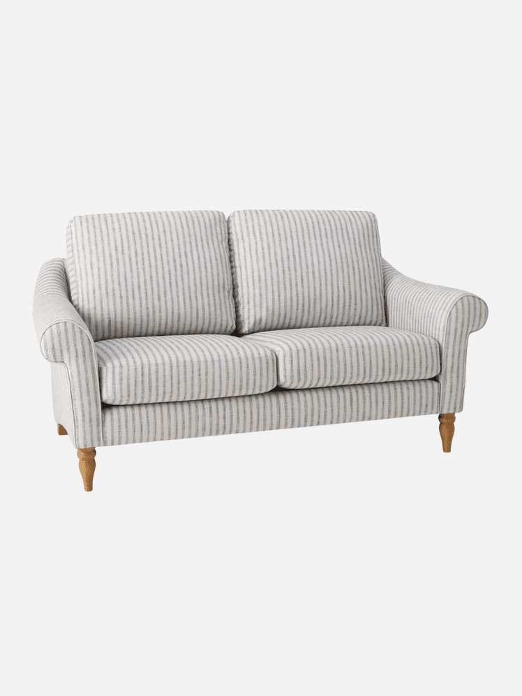 Image may contain: Couch, Furniture, Cushion, and Home Decor